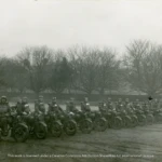 Canadian Provo Corps Motorcycle Formation.
A motorcycle detachment of Number 2 Company of the Canadian Provo Corps in Southern England, circa 1941. The arrow drawn on the photo designates Harry William Manchester (fifteenth from left).