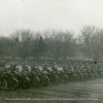 Canadian Provo Corps Motorcycle Formation.
A motorcycle detachment of Number 2 Company of the Canadian Provo Corps in Southern England, circa 1941. The arrow drawn on the photo designates Harry William Manchester (fifteenth from left).
