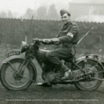 L/Cpl Harry William Manchester on his patrol motorcycle, Southern England, circa 1941.